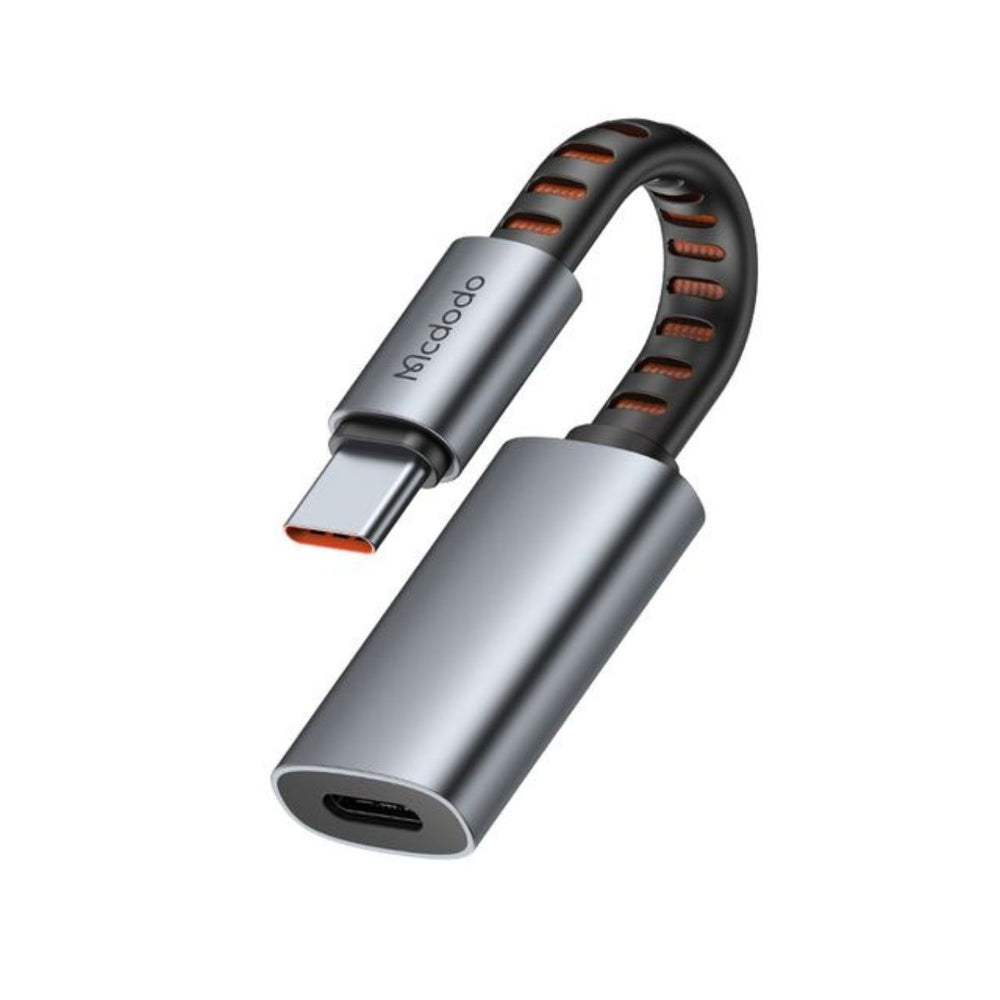 Silver USB-C adapter with black and orange braided cable on a white background